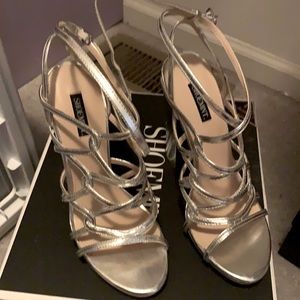 Shoe mint silver strap heels.  Never worn